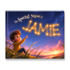 A hardcover personalized children's book with a colorful cover illustration showing a boy pointing at the name 'JAME' formed by glowing stars in a starry sky at sunset. The text reads 'The Special Name of JAME'.