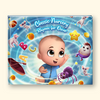 A hardcover children's book titled 'Classic Nursery Rhymes for Oscar' featuring a colorful cartoon illustration of a baby character, a spider, a star, and playful animals on a swirling blue background.