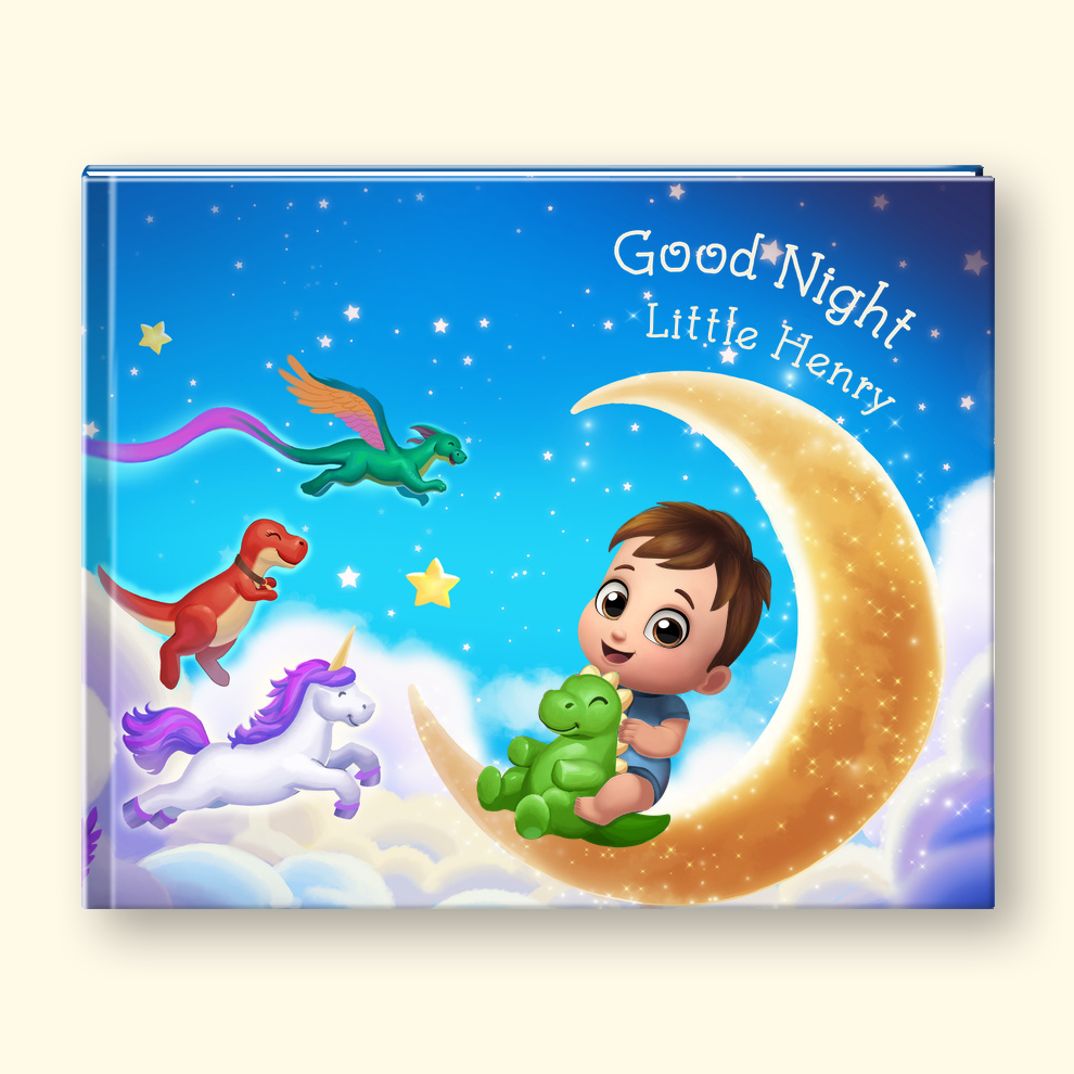 A hardcover children's book cover featuring a whimsical night sky illustration with stars, clouds, a crescent moon, and two dinosaurs flying above a child sitting on the moon holding a green frog. The text reads 'Good Night Little Henry.