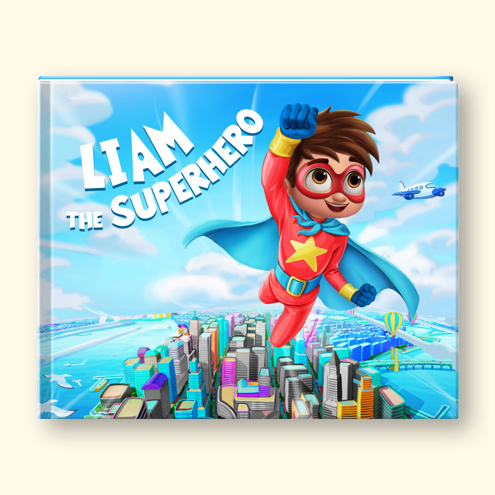 A hardcover children's book cover featuring a colorful cartoon illustration of a boy superhero flying over a city skyline. The title reads 'LIAM THE SUPERHERO' in large white letters.